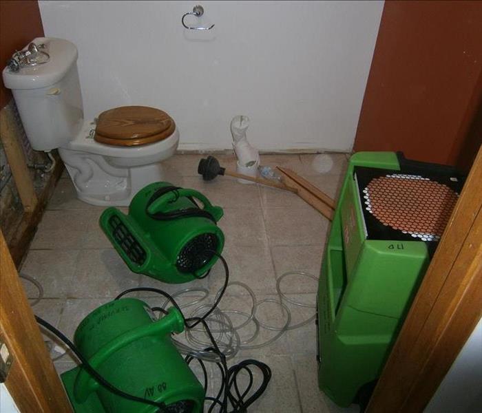 green drying equipment in a flood cut bathroom