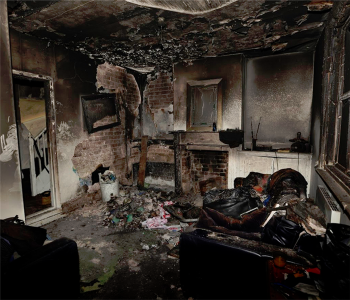 fire damage in the living room of a house